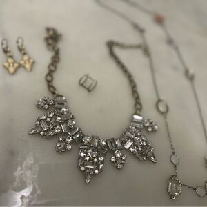 Collection of jewelry. Earrings, necklaces and ring.